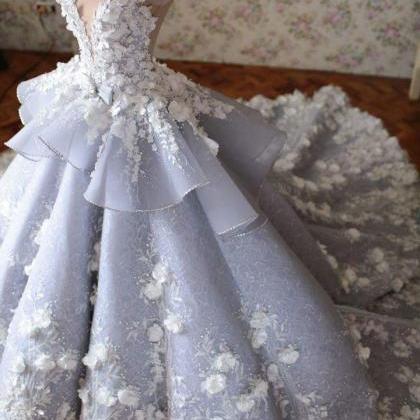 Luxurious Floral Lace Beaded Sweep Train Ball Gown..
