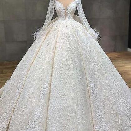 Illusion Long Sleeve Wedding Dress Luxury Beading..