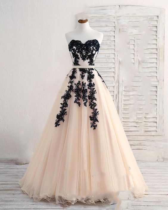 black and champagne gown